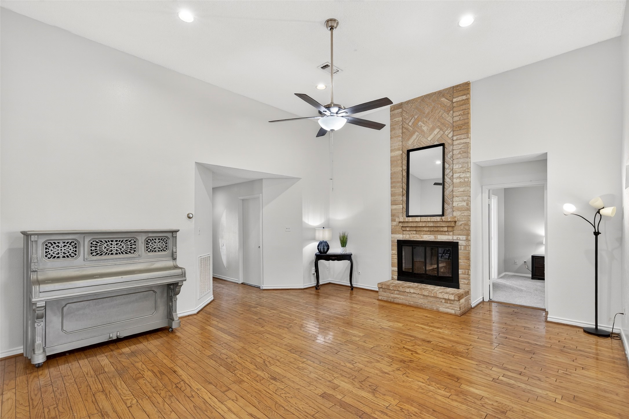 9206 Kirkleigh Lane Spring, TX 77379 - Photo 3 of 47 Family room with the fireplace as your focal point.