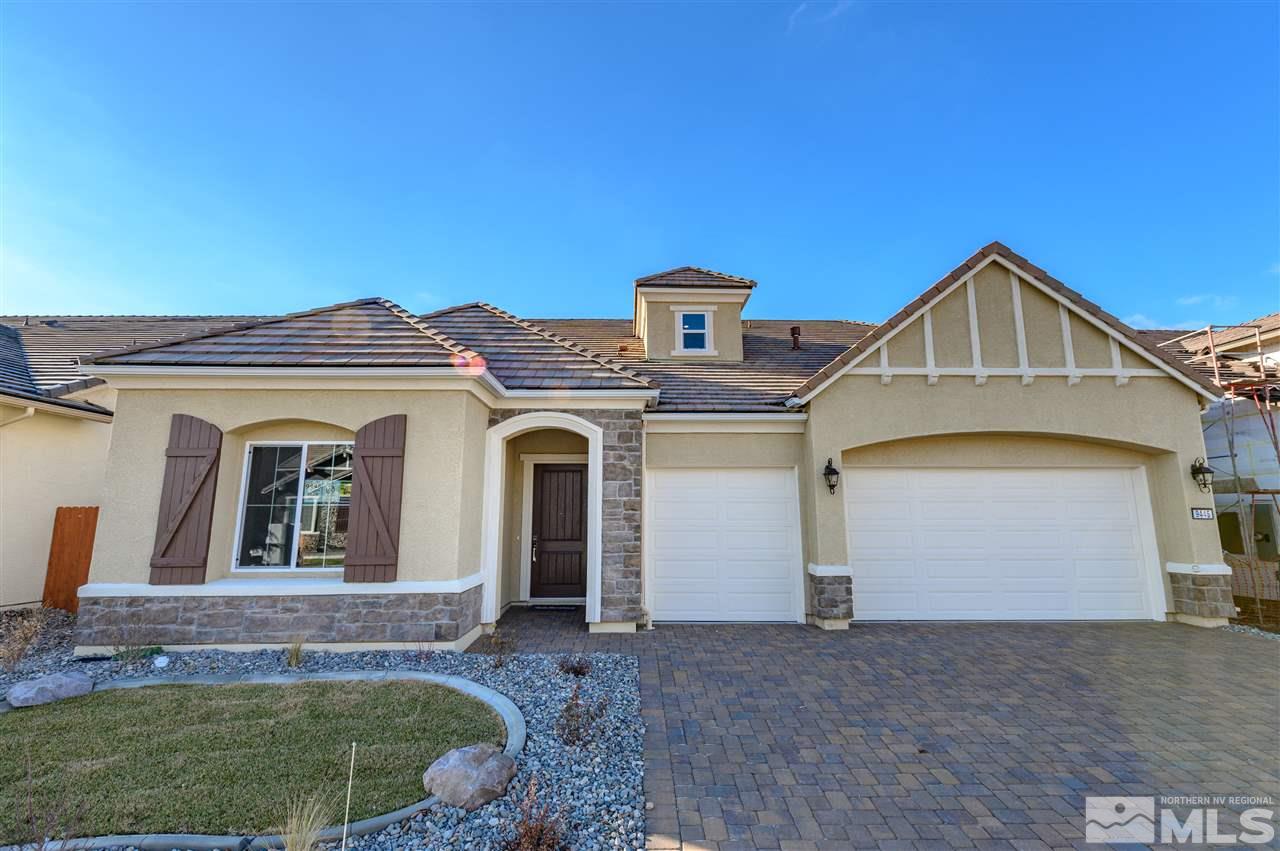 9445 Hawkshead Road, Unit HOMESITE 91 Reno, NV 89521 - Photo 1 of 27 a front view of a house with a yard