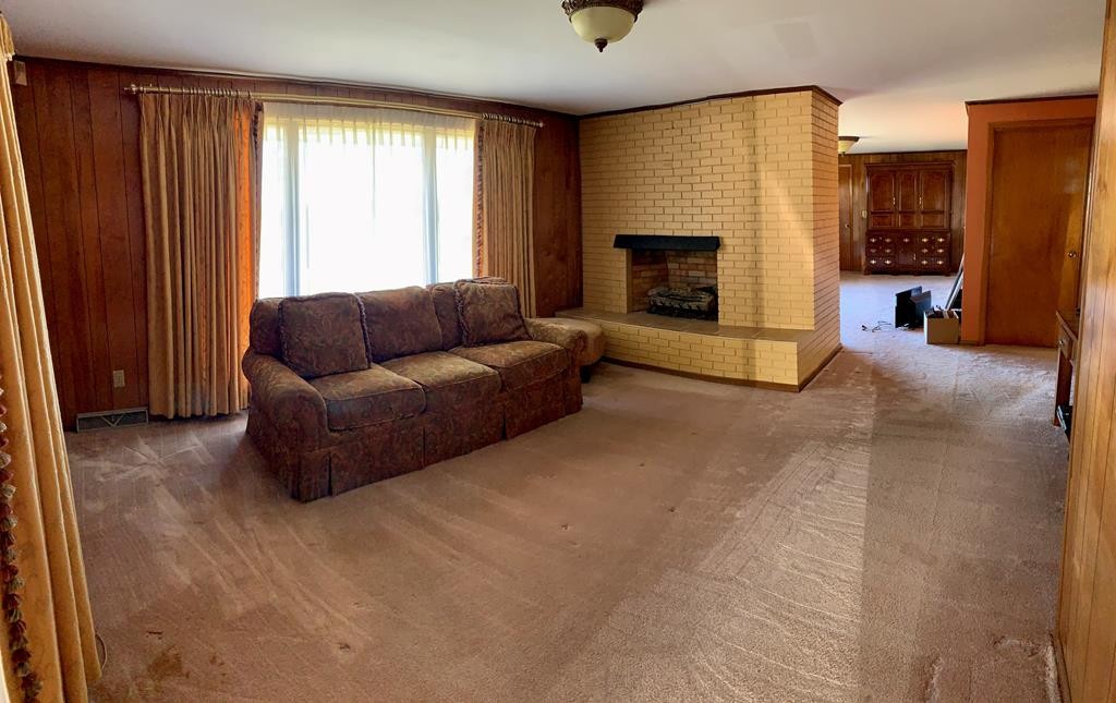 201 County Line Road Dandridge, TN 37725 - Photo 6 of 23 a living room with furniture and a fireplace