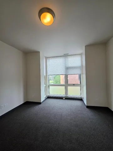 a view of hallway with closet