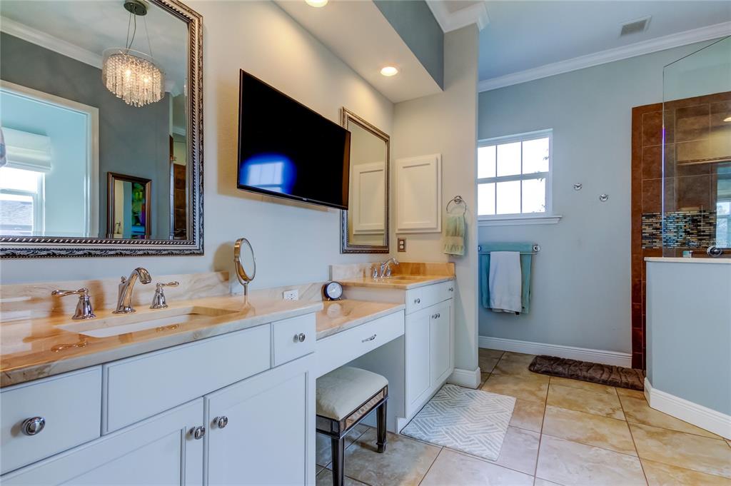 6367 Foxbrook Trail Parrish, FL 34219 - Photo 18 of 25 a spacious bathroom with a double vanity sink and a mirror