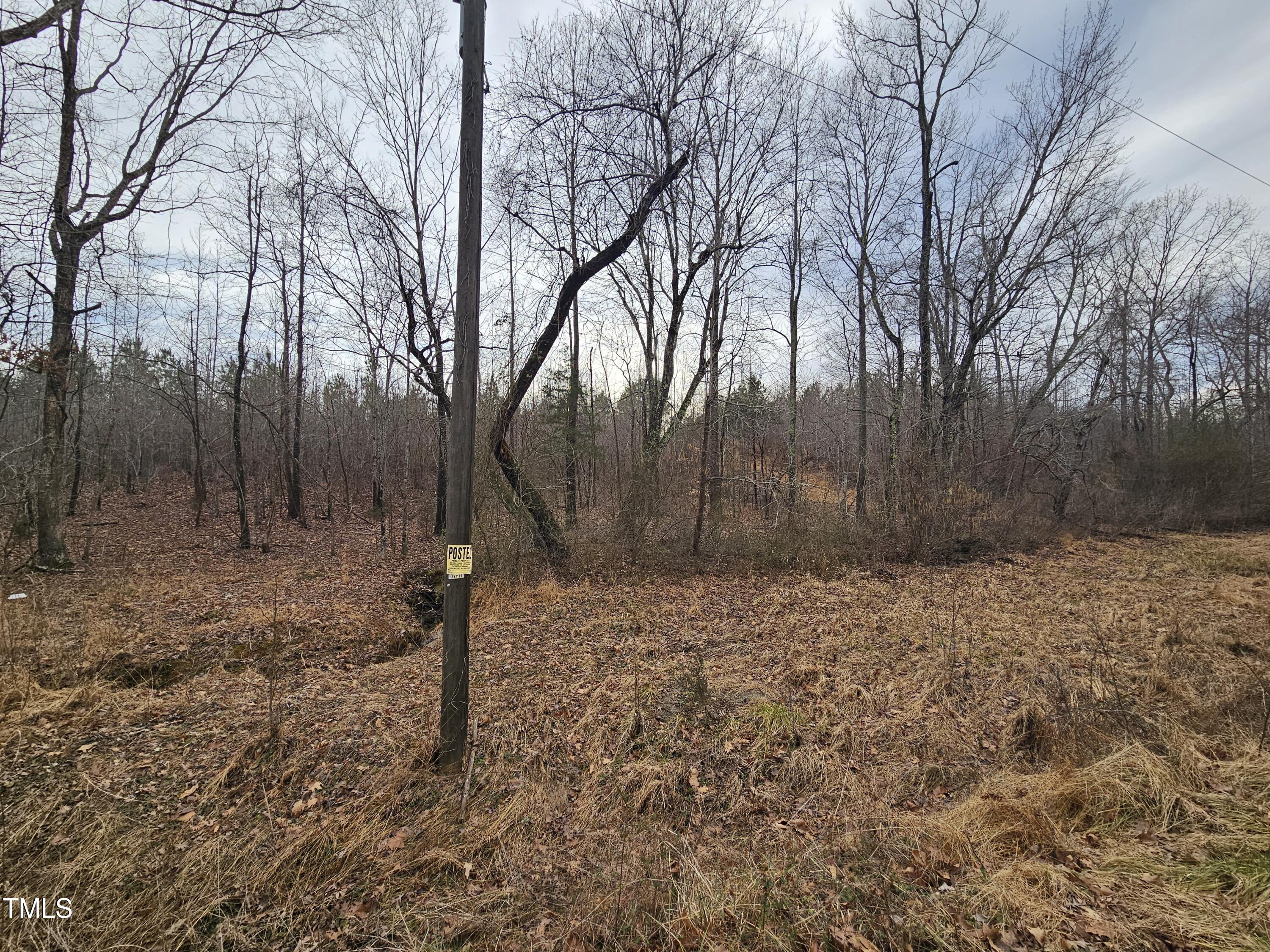 0 Charlie Stovall Road Oxford, NC 27565 - Photo 4 of 9 a backyard of a house with lots of green space