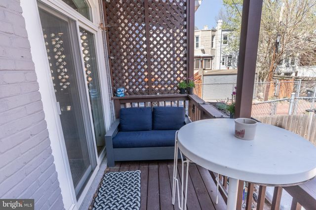 a workspace with furniture and window