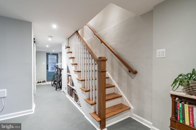 a view of entryway with stairs and furniture