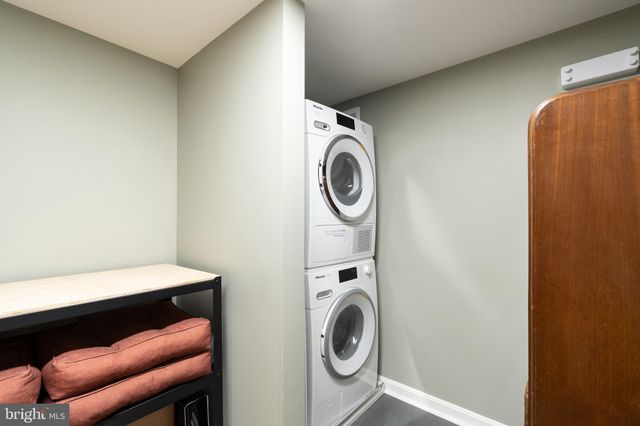 a room with a dryer and washer