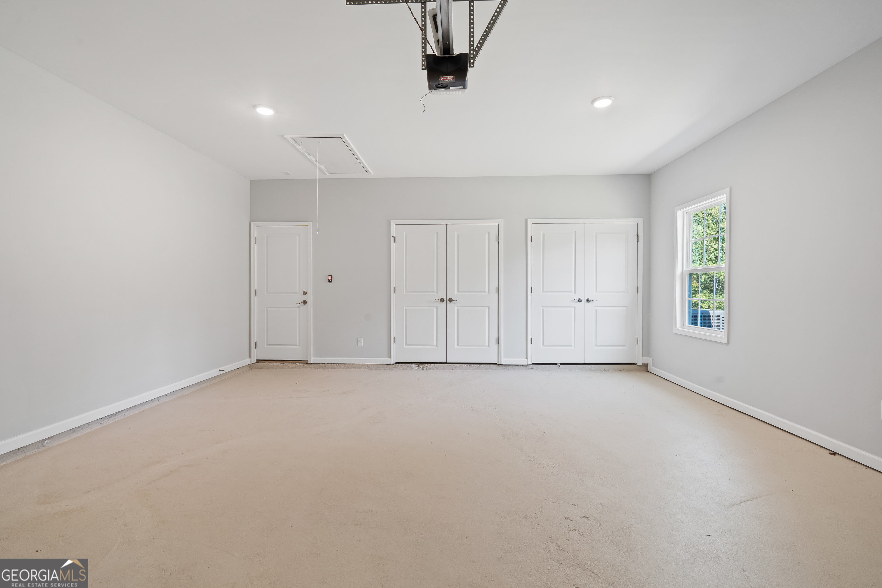 4477 Rivercliff Way Gray, GA 31032 - Photo 55 of 62 an empty room with windows and closet