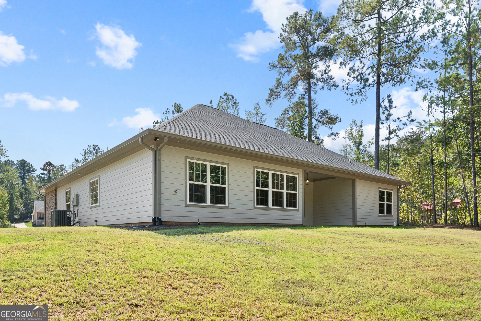 4477 Rivercliff Way Gray, GA 31032 - Photo 60 of 62 a view of a house with a backyard