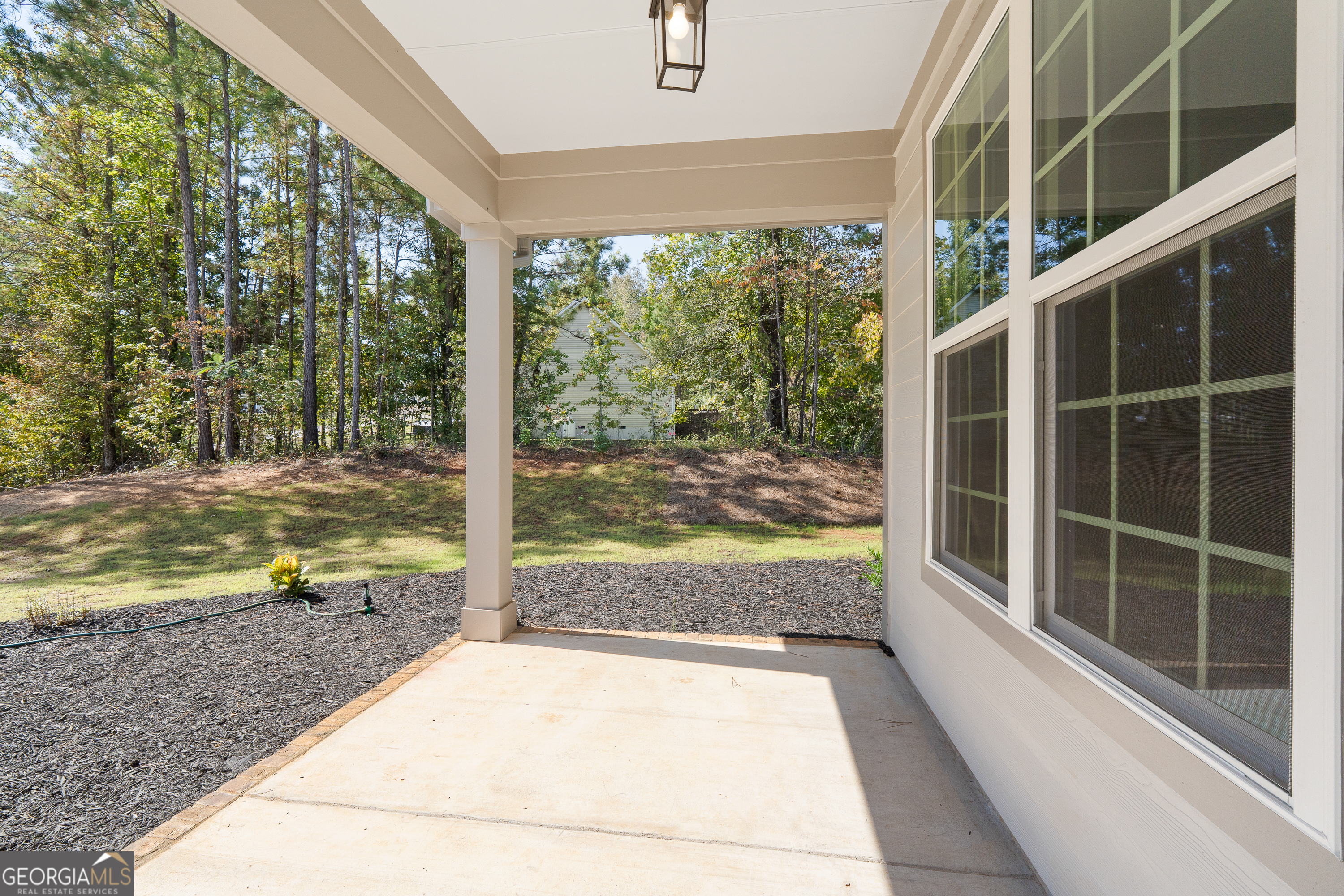4477 Rivercliff Way Gray, GA 31032 - Photo 6 of 62 a view of a large window with an outdoor view