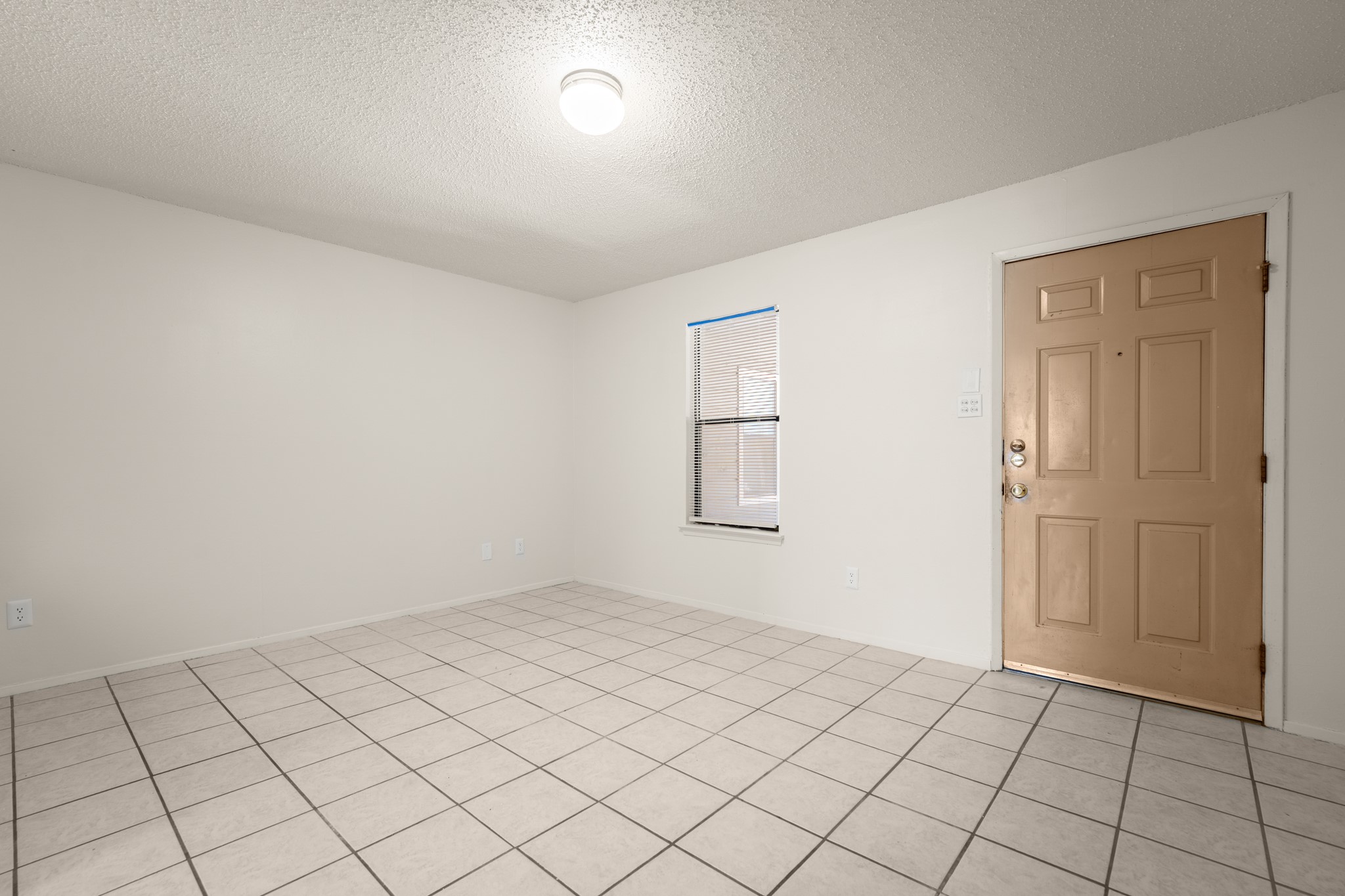 3506 Speedway, Unit 104 Austin, TX 78705 - Photo 6 of 10 a view of an empty room and window