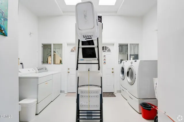 a bathroom with a sink and mirror
