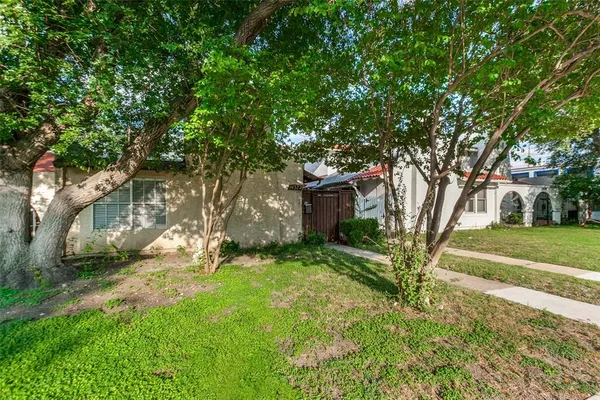 a view of backyard with green space