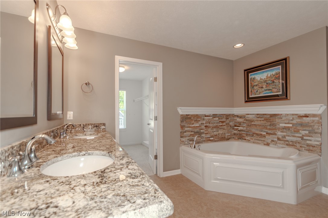8375 Raleigh Place Painesville, OH 44077 - Photo 33 of 45 Dual Vanities and Corner Soaking Tub