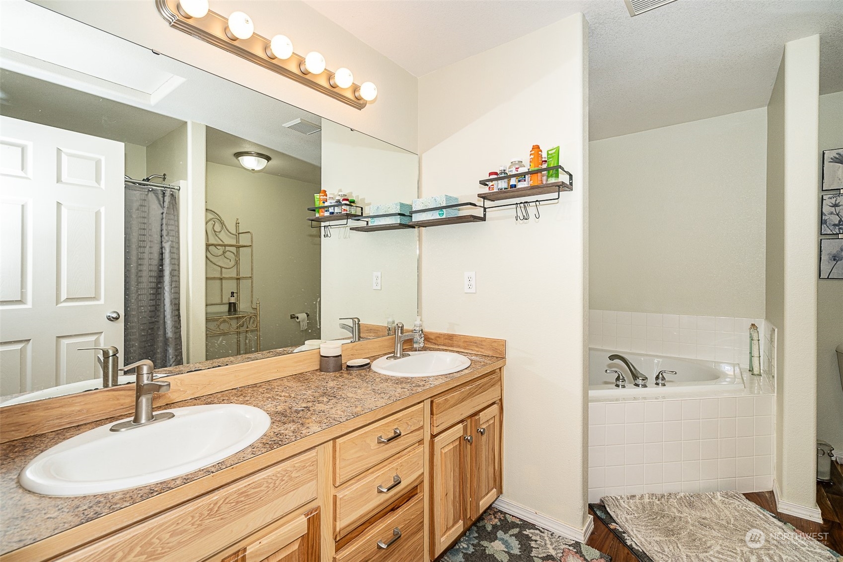 330-38 Brockway Road Chehalis, WA 98532 - Photo 19 of 40 a bathroom with a granite countertop sink and a mirror