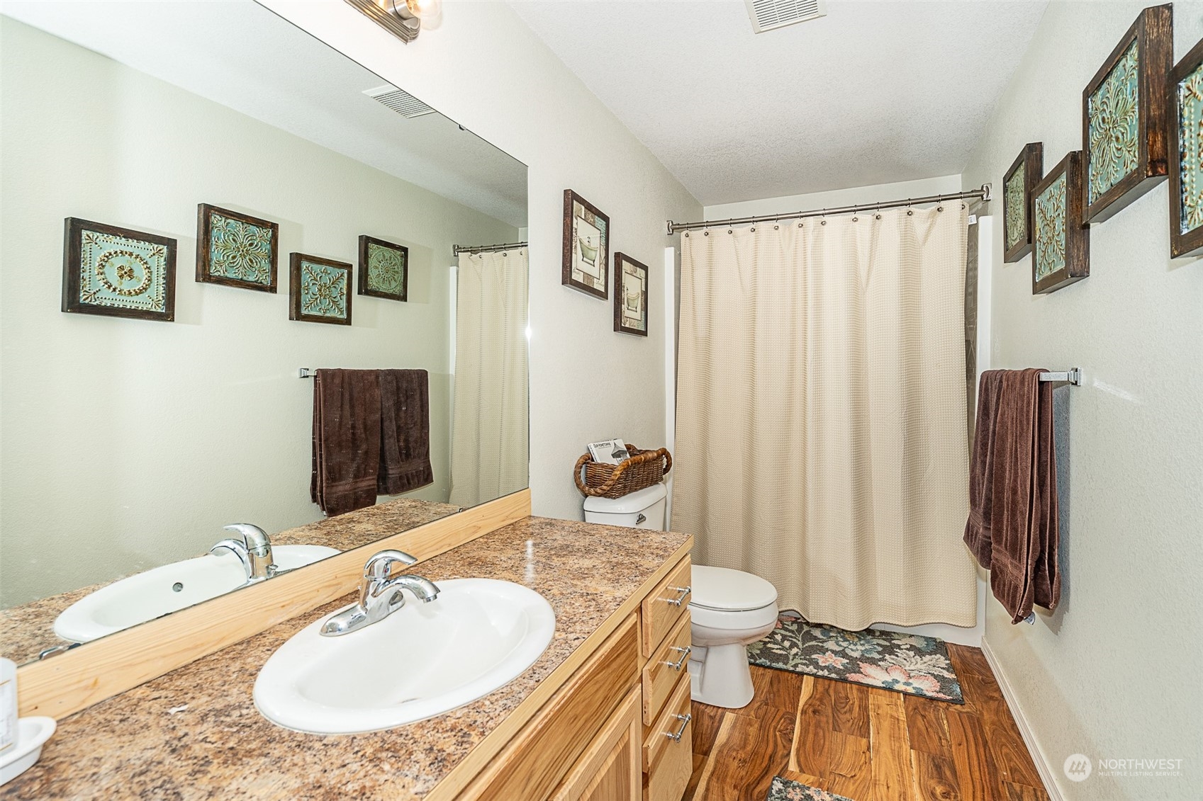 330-38 Brockway Road Chehalis, WA 98532 - Photo 20 of 40 a bathroom with a granite countertop sink and a mirror