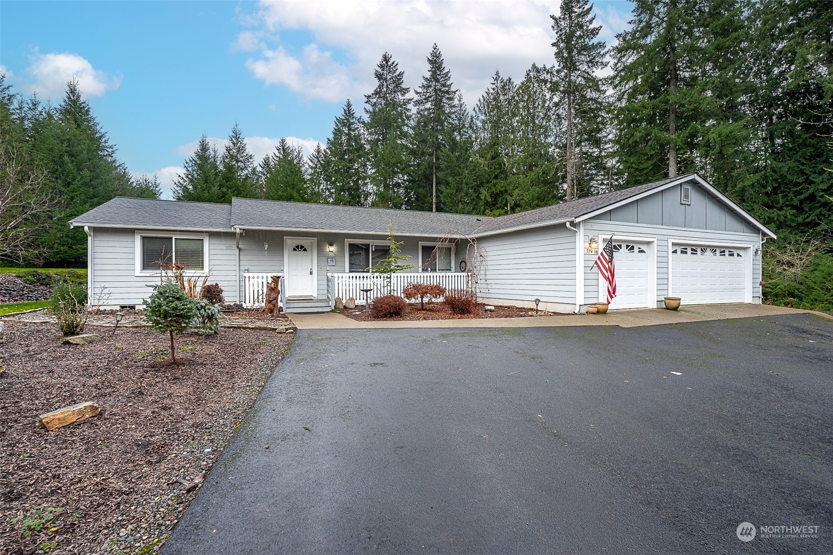 330-38 Brockway Road Chehalis, WA 98532 - Photo 2 of 40 a view of a house with backyard and trees