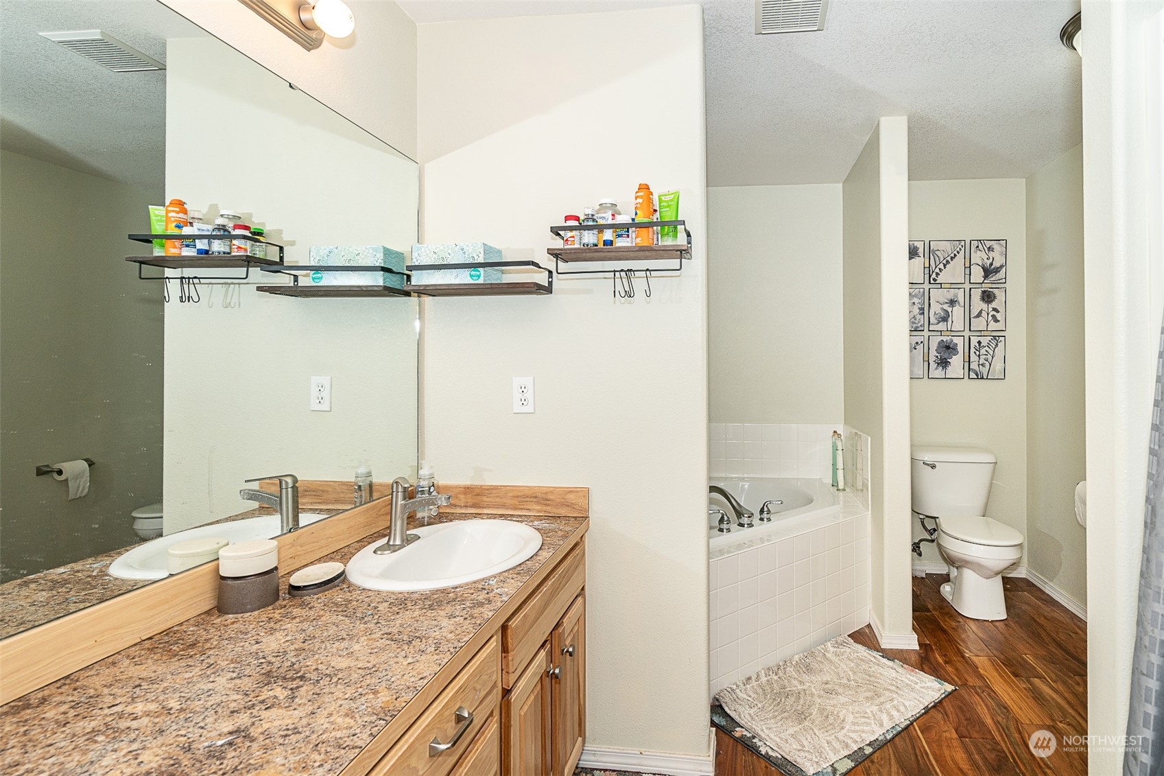 330-38 Brockway Road Chehalis, WA 98532 - Photo 21 of 40 a bathroom with a granite countertop sink a toilet and a shower