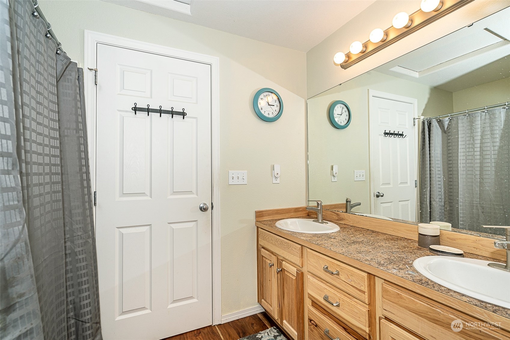 330-38 Brockway Road Chehalis, WA 98532 - Photo 23 of 40 a bathroom with a granite countertop double vanity sink and a mirror