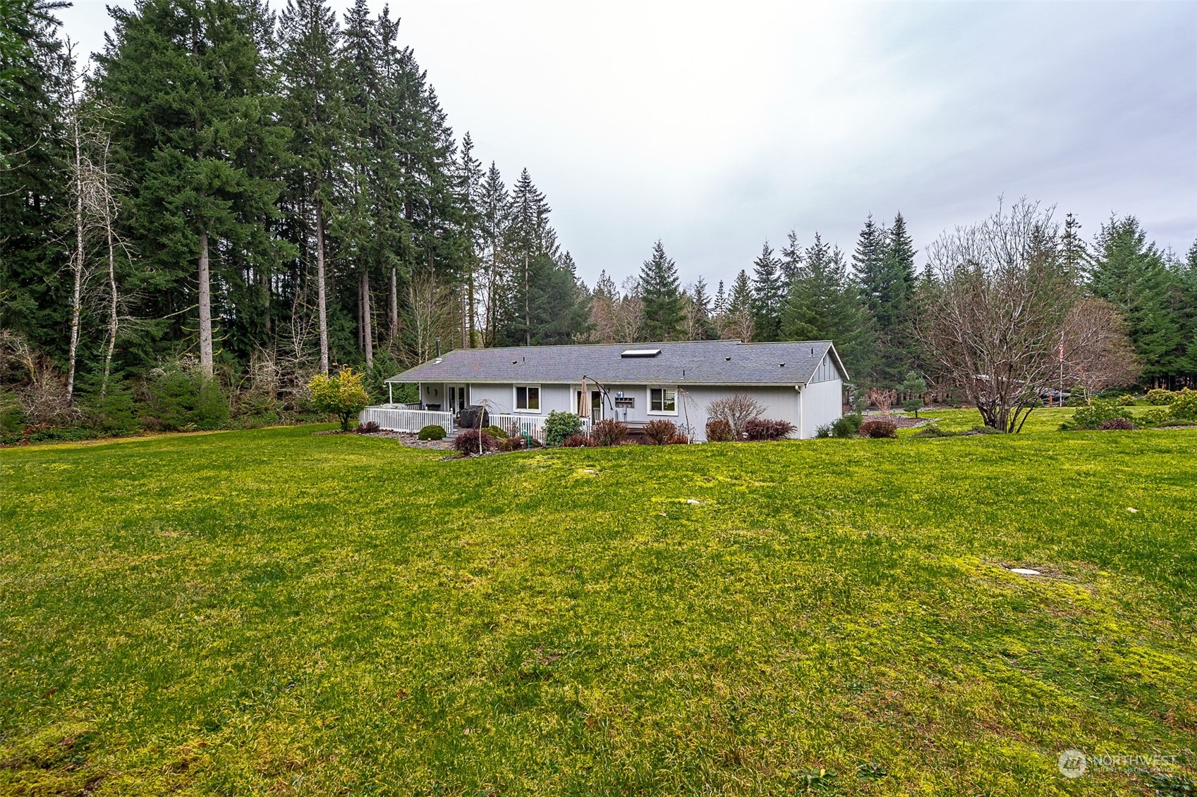 330-38 Brockway Road Chehalis, WA 98532 - Photo 30 of 40 a view of a house with a big yard and large trees