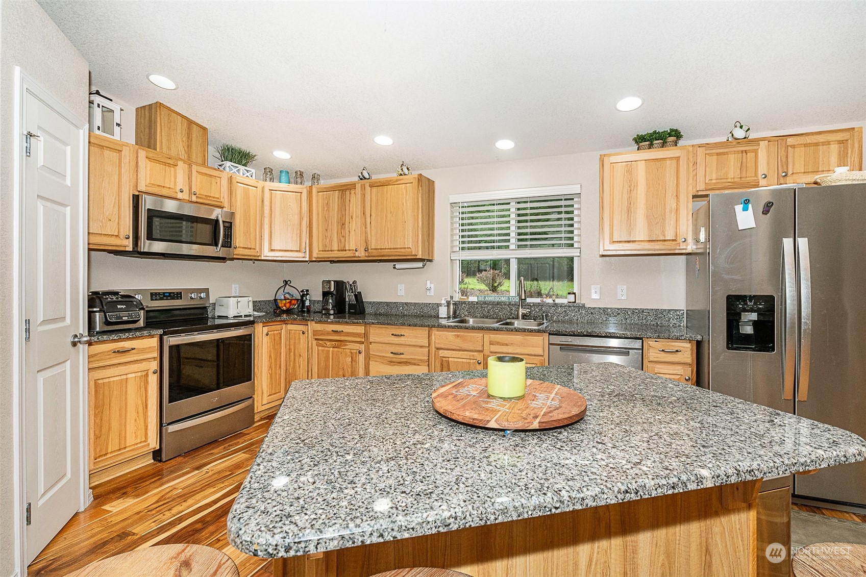 330-38 Brockway Road Chehalis, WA 98532 - Photo 7 of 40 a kitchen with stainless steel appliances granite countertop a sink a stove counter space and cabinets