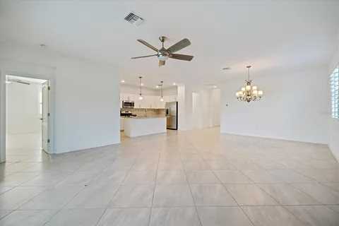 a view of an outside dining space with furniture