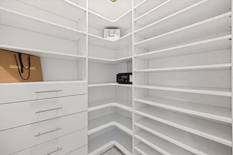 a bathroom with a granite countertop sink a toilet and bathtub