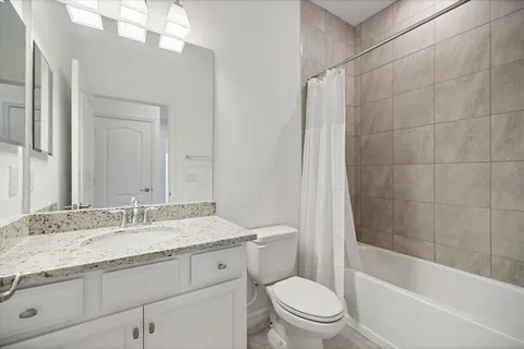 an aerial view of a house with a ocean view