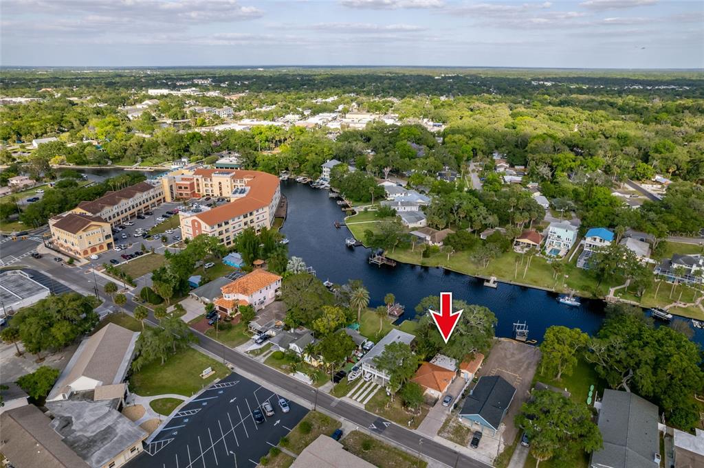 6142 River Road New Port Richey, FL 34652 - Photo 1 of 1 an aerial view of residential houses with outdoor space and swimming pool