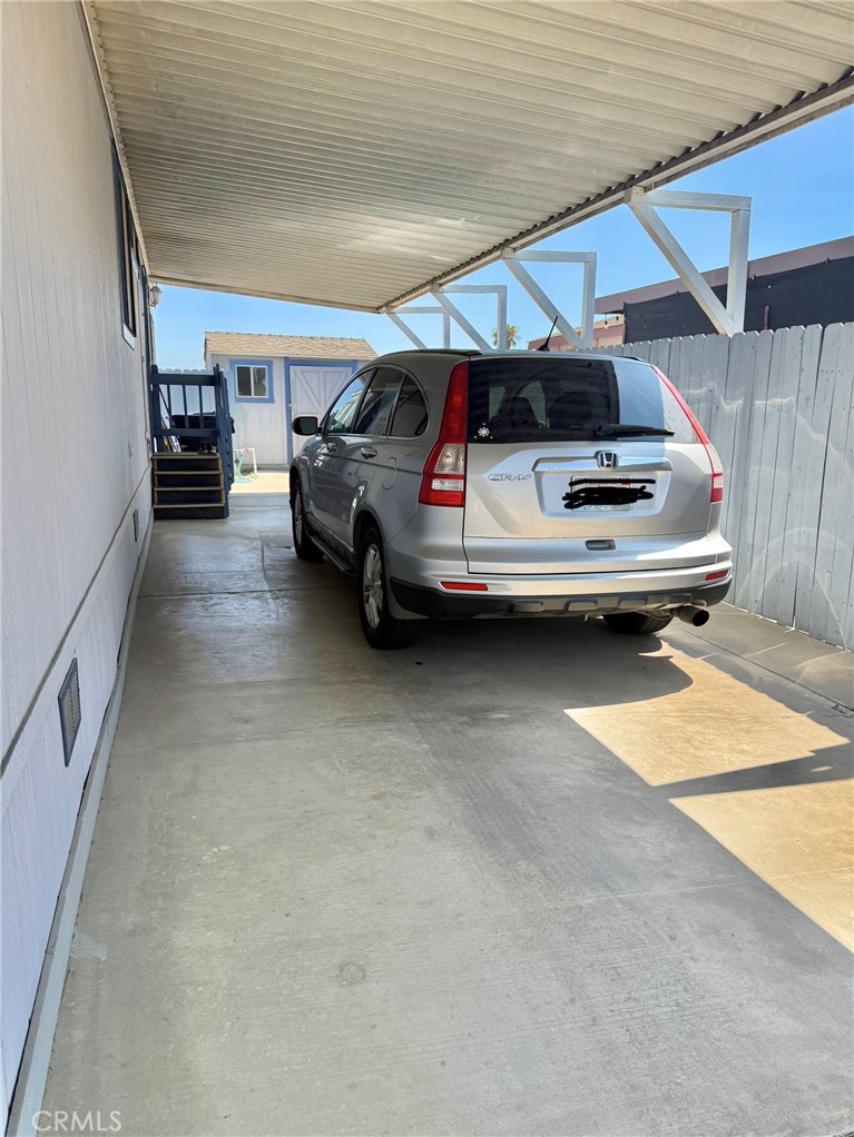 4080 Pedley Road, Unit 189 Jurupa Valley, CA 92509 - Photo 14 of 16 a bedroom with furniture and window