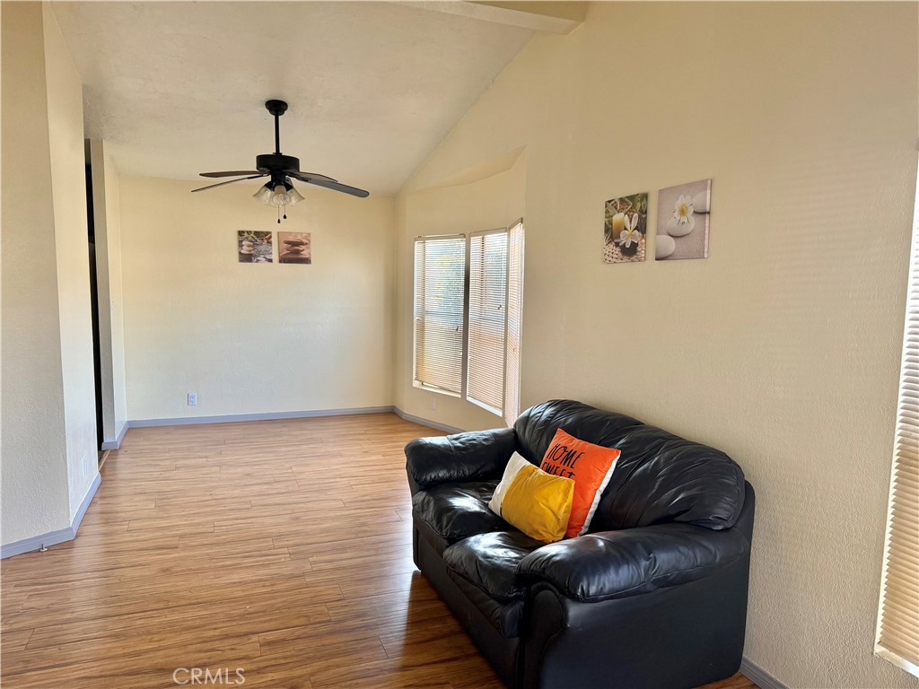 4080 Pedley Road, Unit 189 Jurupa Valley, CA 92509 - Photo 4 of 16 a living room with furniture and a rug