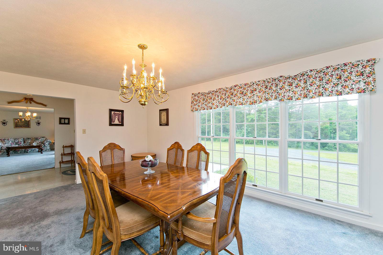 841 Guard Hill Road Middletown, VA 22645 - Photo 15 of 48 Dining room with tall windows for natural light