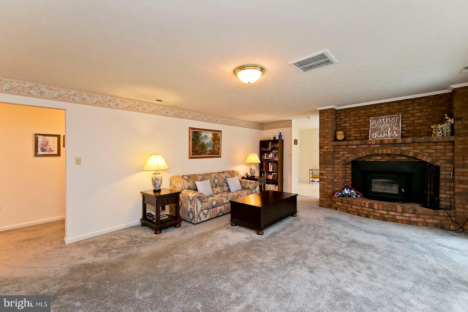 841 Guard Hill Road Middletown, VA 22645 - Photo 9 of 48 Family room with wood burning fireplace