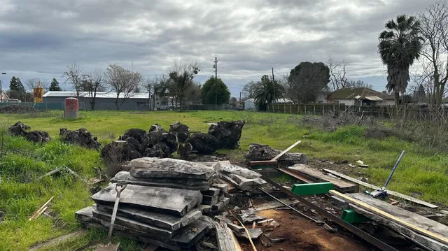 a backyard of a house with lots of green space