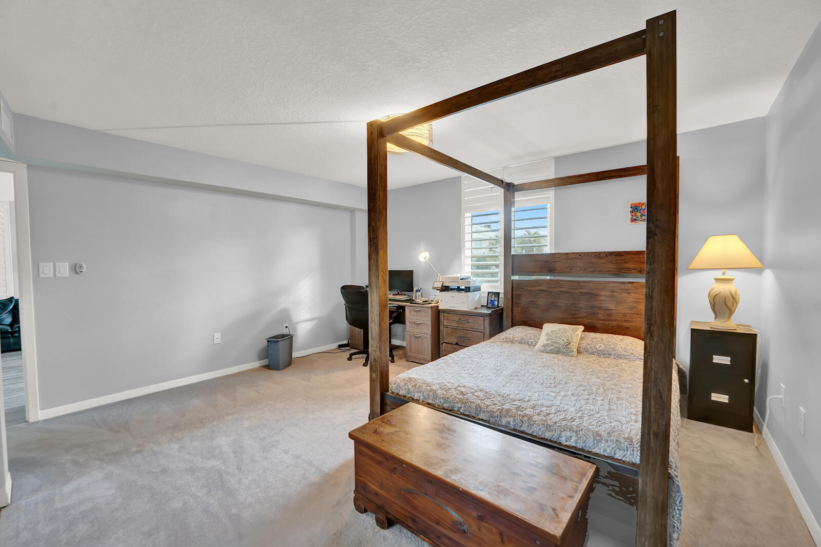 30 Moreno Point Road, Unit 102A Destin, FL 32541 - Photo 13 of 52 a room with a table and chairs