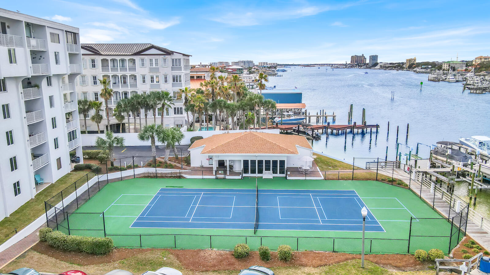 30 Moreno Point Road, Unit 102A Destin, FL 32541 - Photo 33 of 52 a view of a city with tall buildings