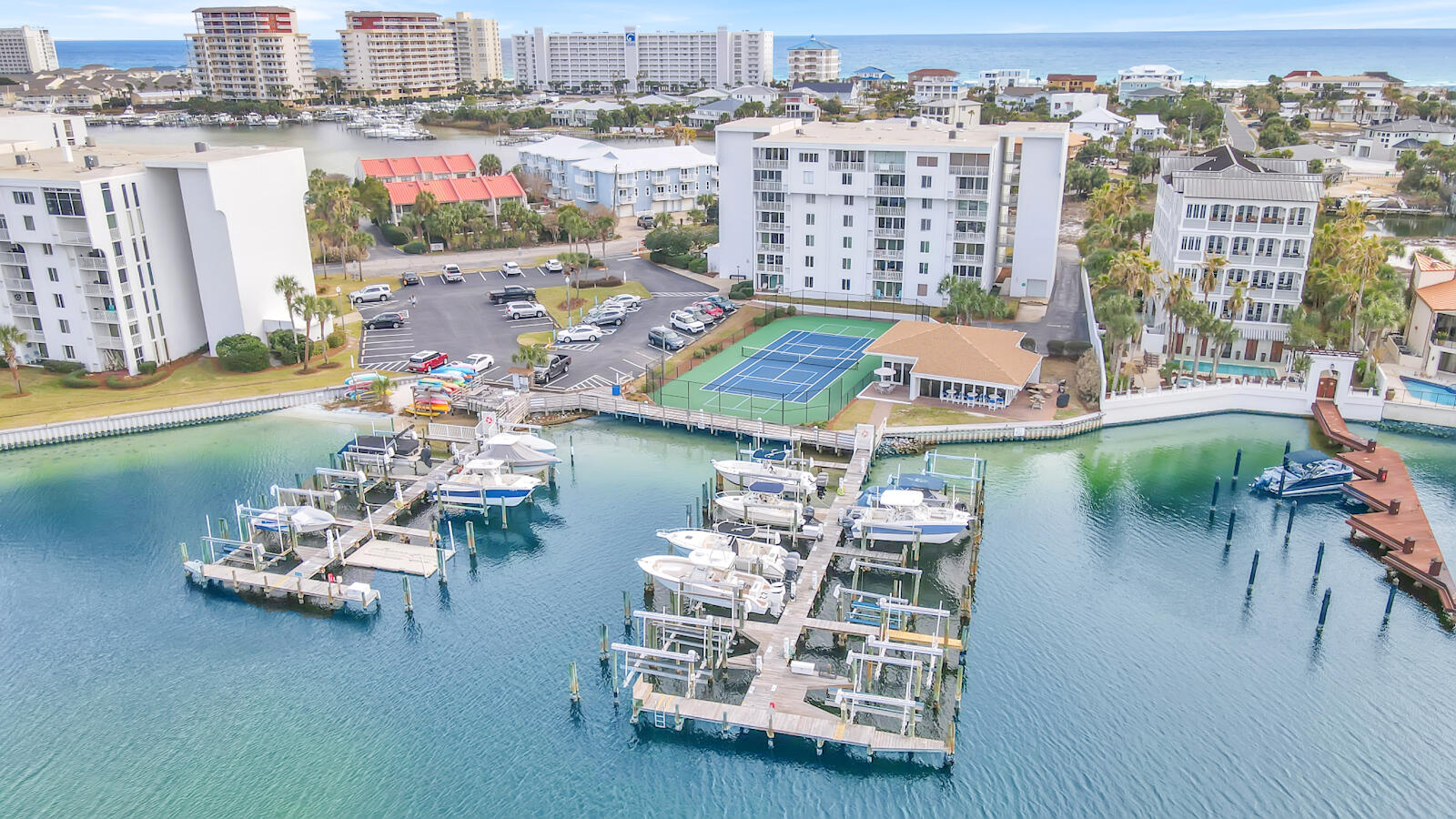 30 Moreno Point Road, Unit 102A Destin, FL 32541 - Photo 41 of 52 a view of a lake with a patio