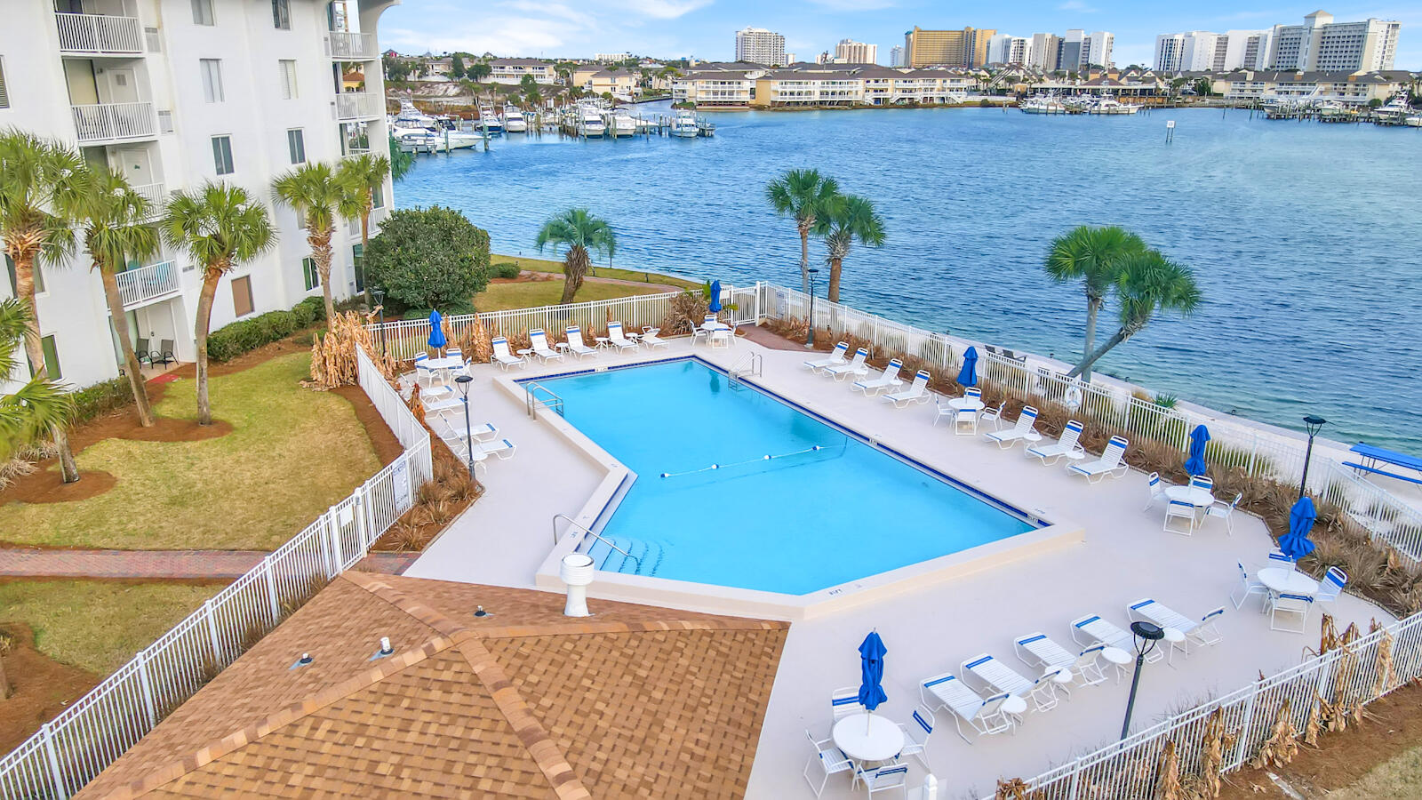 30 Moreno Point Road, Unit 102A Destin, FL 32541 - Photo 48 of 52 a view of a swimming pool with an outdoor seating