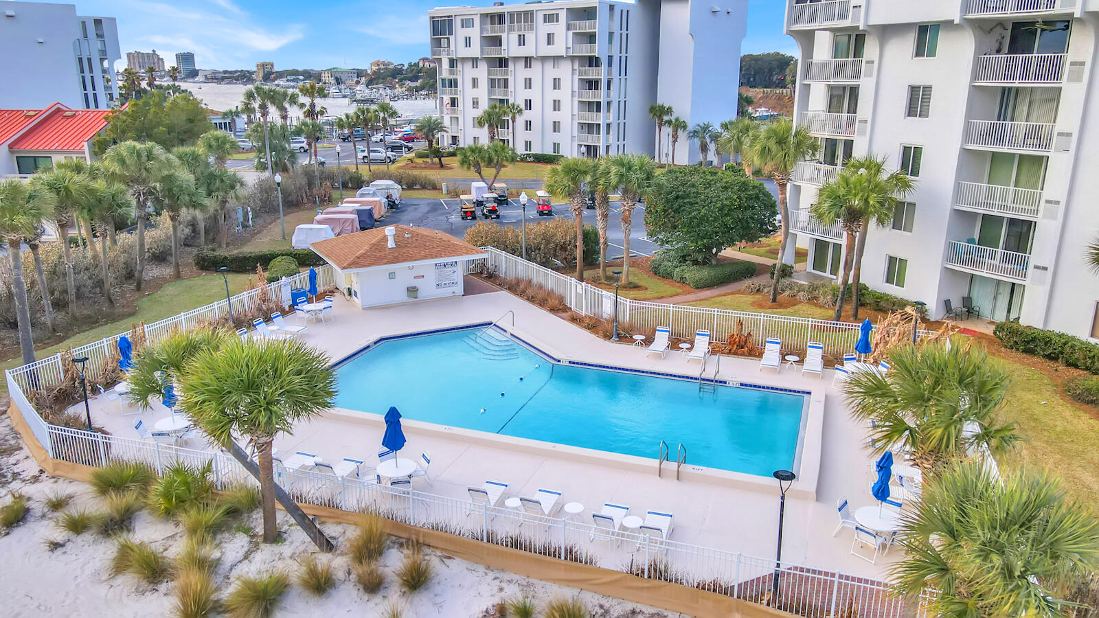 30 Moreno Point Road, Unit 102A Destin, FL 32541 - Photo 49 of 52 a view of a city with tall buildings
