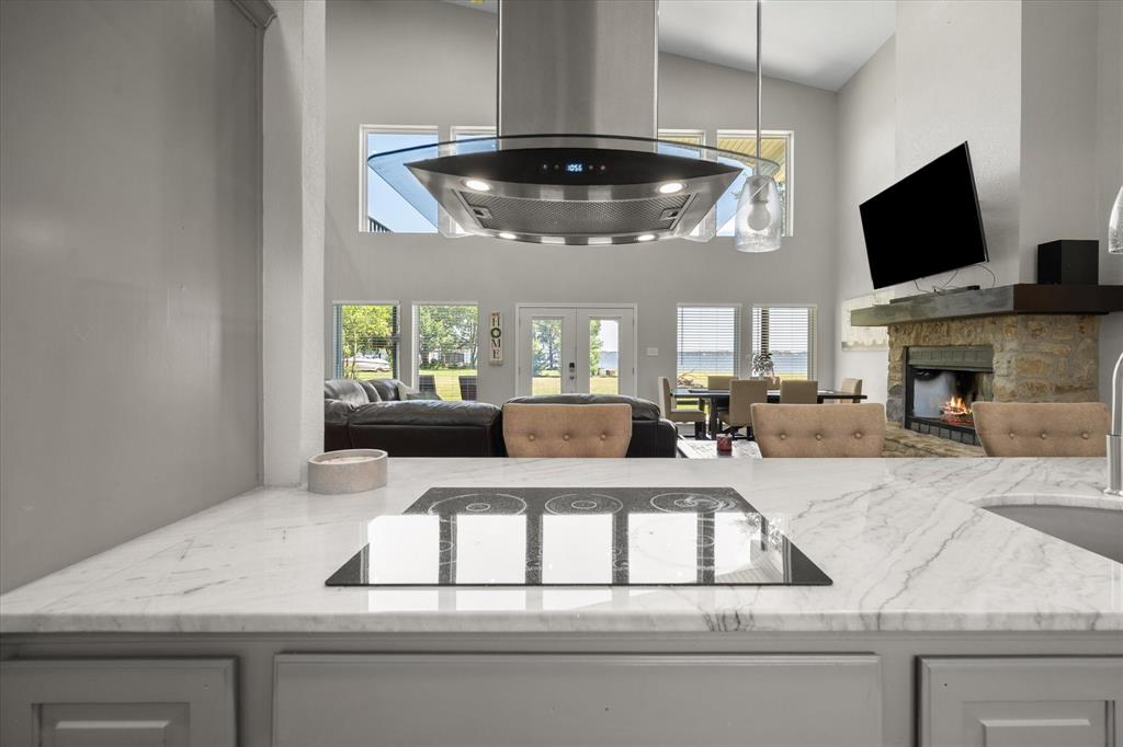 113 Cinch Buckle Ranch Road Trinidad, TX 75163 - Photo 11 of 36 a living room with furniture and a flat screen tv