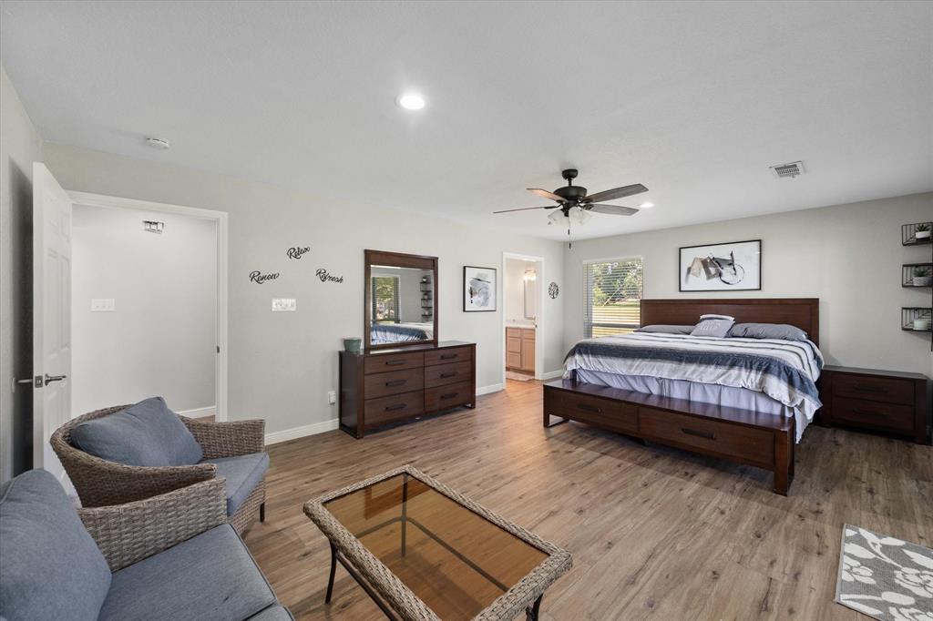 113 Cinch Buckle Ranch Road Trinidad, TX 75163 - Photo 20 of 36 a bedroom with a bed and furniture