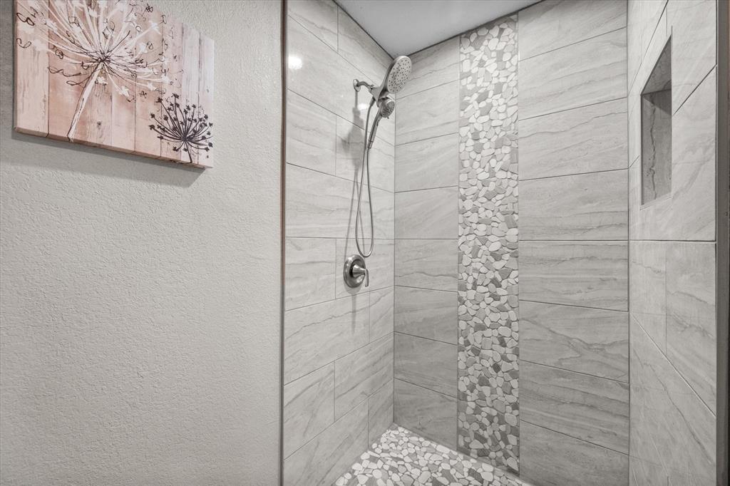 113 Cinch Buckle Ranch Road Trinidad, TX 75163 - Photo 30 of 36 a bathroom with a shower