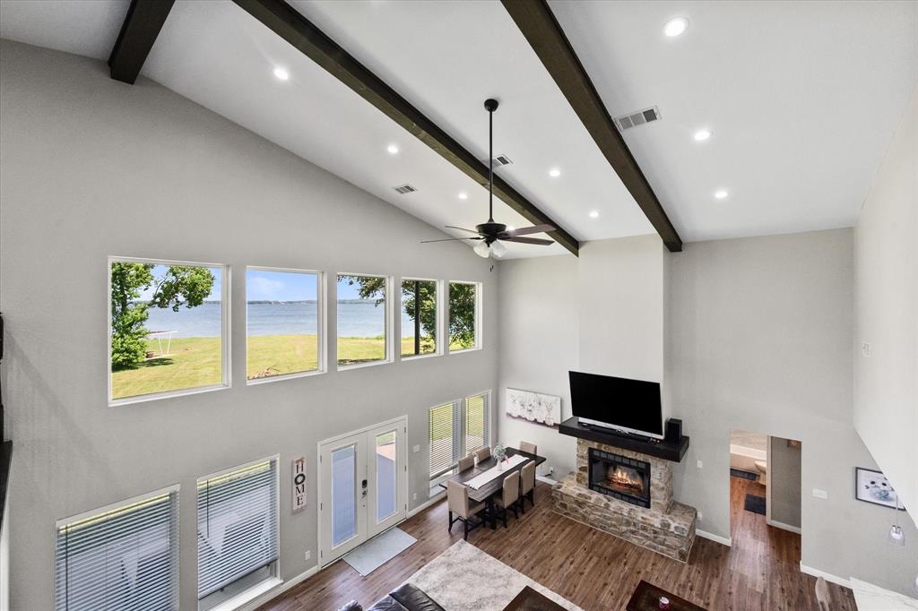 113 Cinch Buckle Ranch Road Trinidad, TX 75163 - Photo 31 of 36 a living room with furniture and a flat screen tv