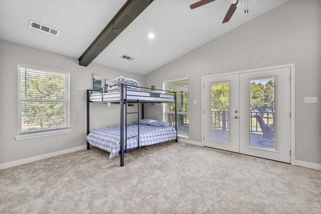 113 Cinch Buckle Ranch Road Trinidad, TX 75163 - Photo 33 of 36 a bedroom with furniture and window