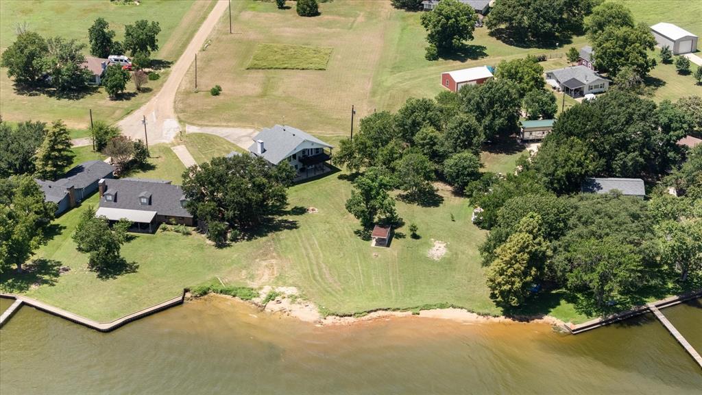 113 Cinch Buckle Ranch Road Trinidad, TX 75163 - Photo 36 of 36 an aerial view of residential houses with outdoor space
