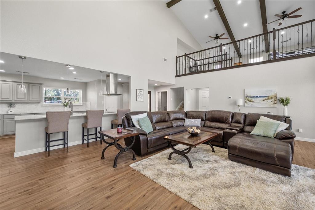113 Cinch Buckle Ranch Road Trinidad, TX 75163 - Photo 8 of 36 a living room with furniture or kitchen view and a wooden floor