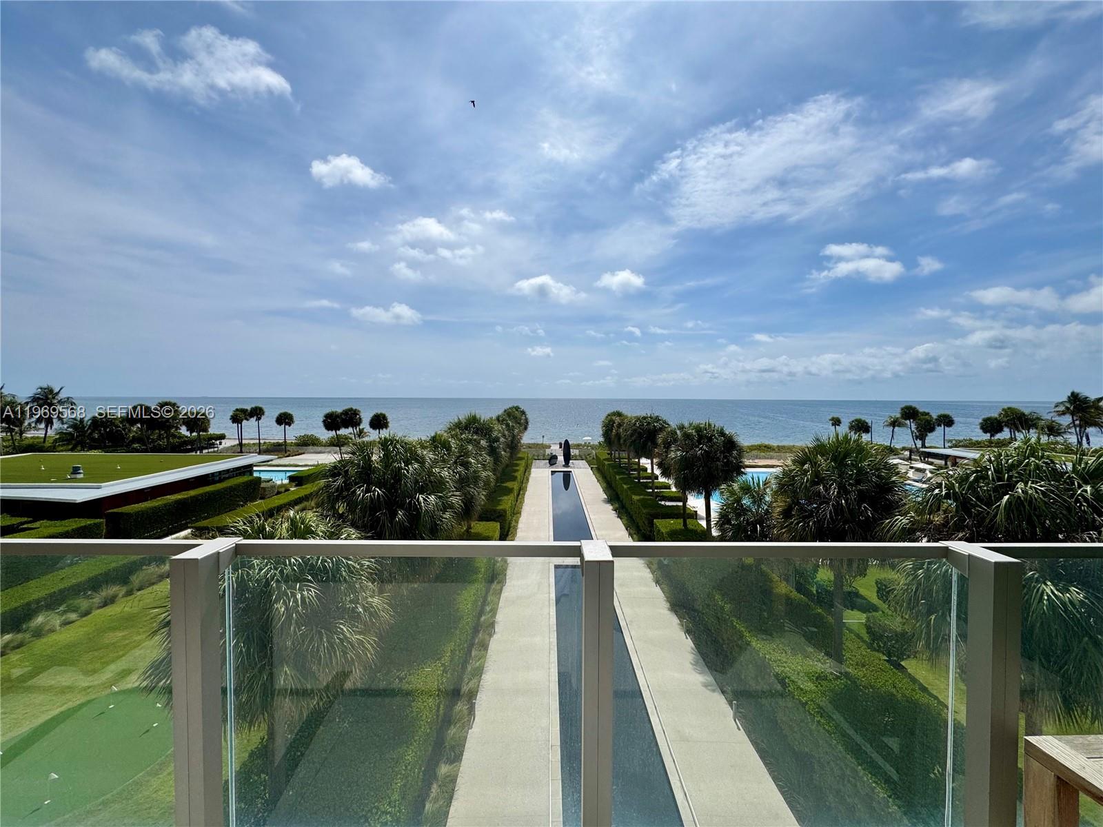 a view of a lake with a garden