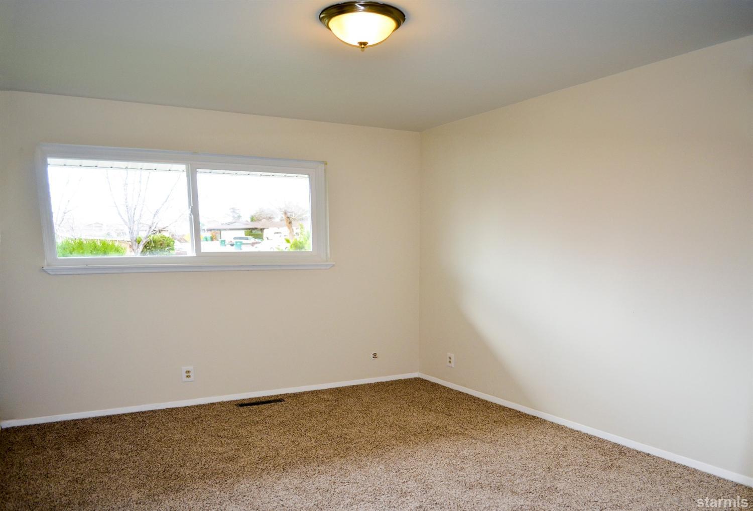 1095 Kings Row Reno, NV 89503 - Photo 19 of 23 an empty room with a window
