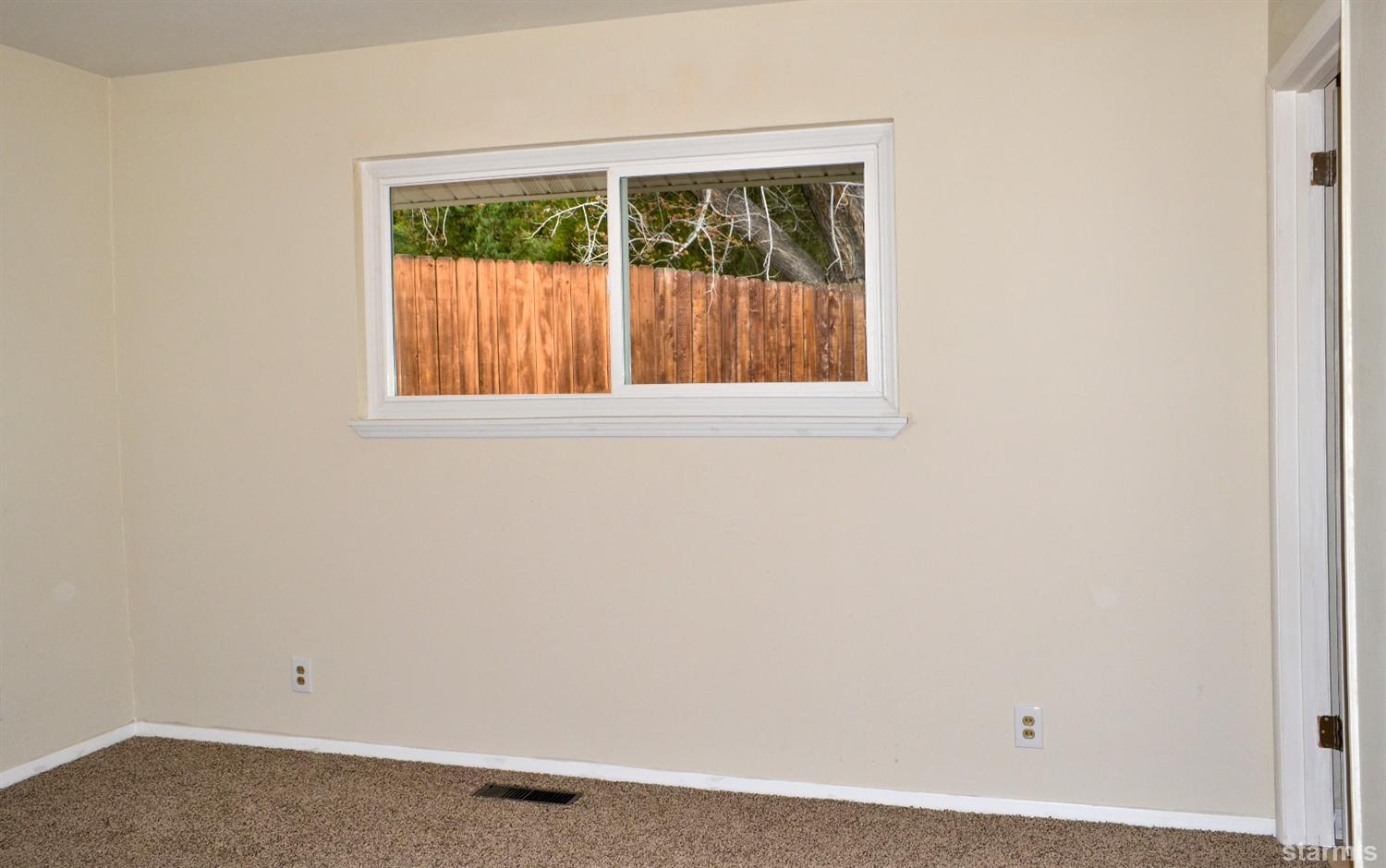 1095 Kings Row Reno, NV 89503 - Photo 23 of 23 a view of an empty room with a window