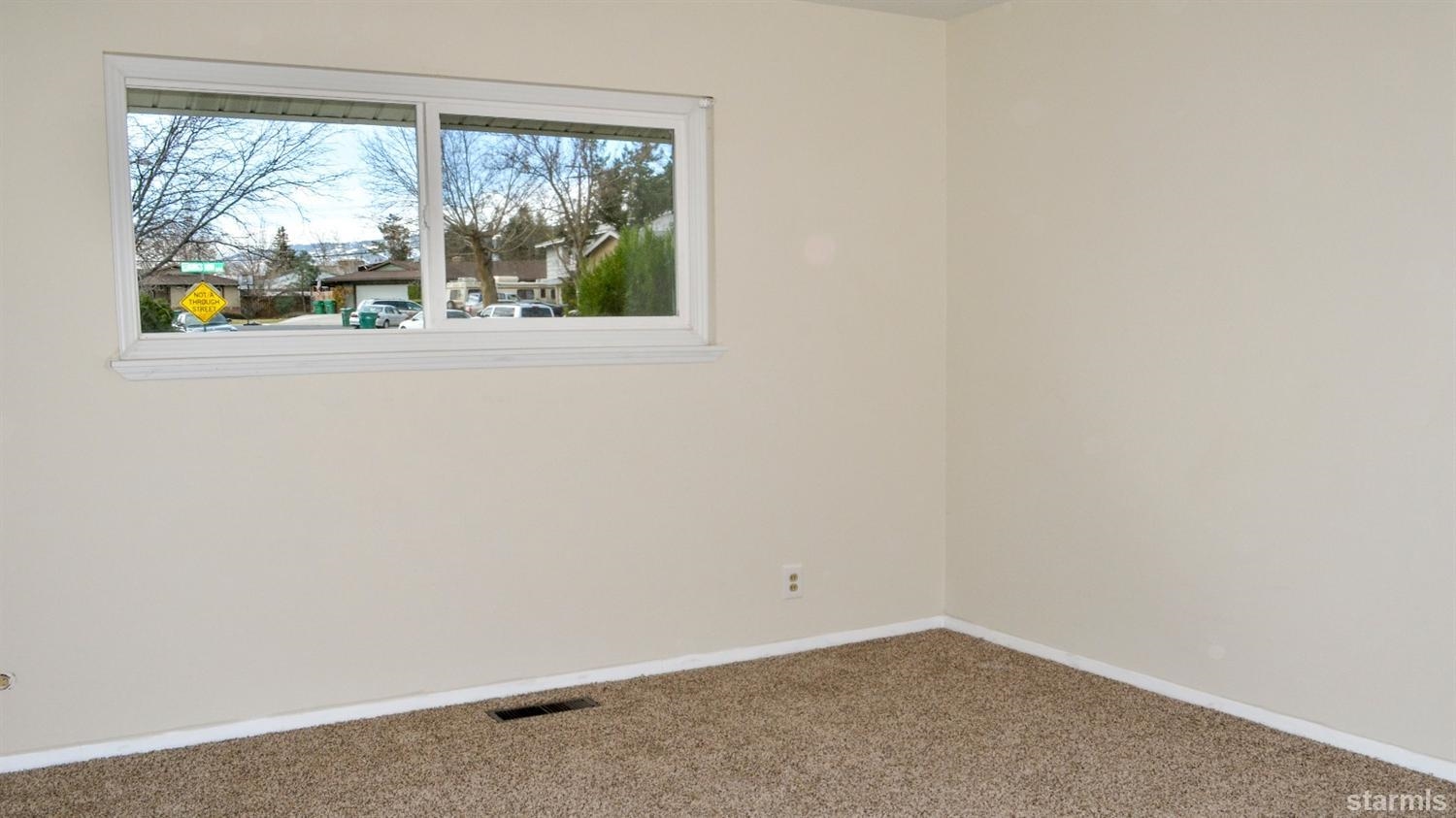 1095 Kings Row Reno, NV 89503 - Photo 10 of 23 a view of empty room with window