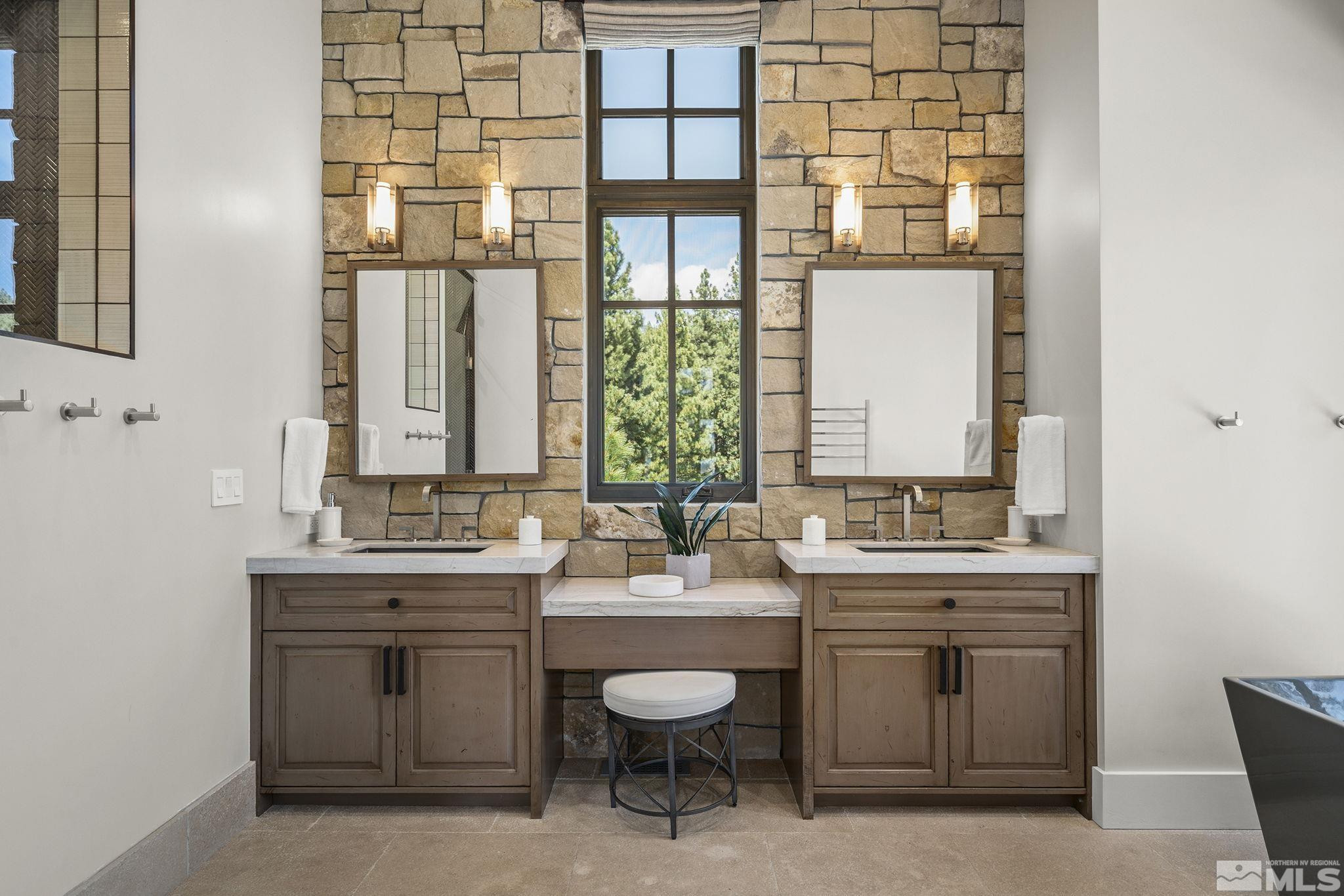3513 Cutoff Trail Carson City, NV 89705 - Photo 24 of 43 a bathroom with a sink a toilet and a window