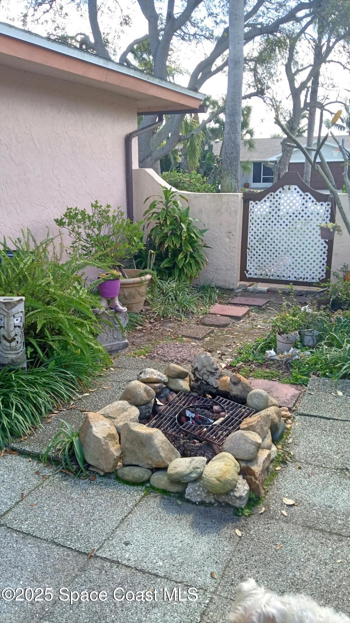 176 Sand Dollar Road Indialantic, FL 32903 - Photo 12 of 15 EVEN A TUCKED AWAY FIREPIT!